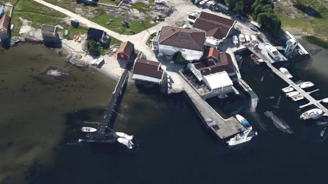 Ferry pier at Herfol, center right, and old post office, center (Google Maps / Airbus)
