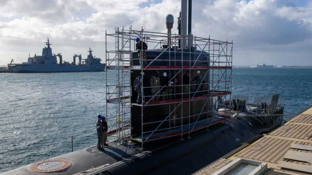 US Navy and Royal Australian Navy sailors attached to the submarine tender USS Emory S. Land performing maintenance aboard Virginia-class fast-attack submarine USS Hawaii at HMAS Stirling, Western Australia, in August 2024 (Mario E. Reyes Villatoro/US Navy Photo)