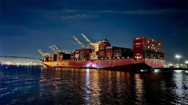 fire damaged containership ship returning to berth