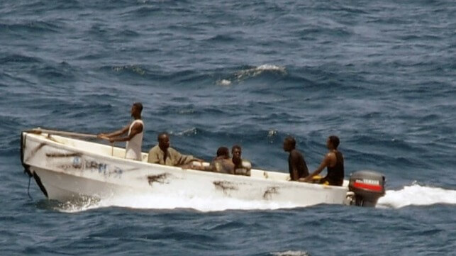 small boat with pirates
